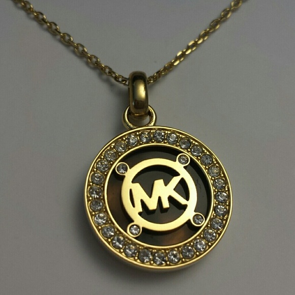 Michael Kors Jewelry - Michael Kors NWT Gold Logo Pavé Crystal Pendant